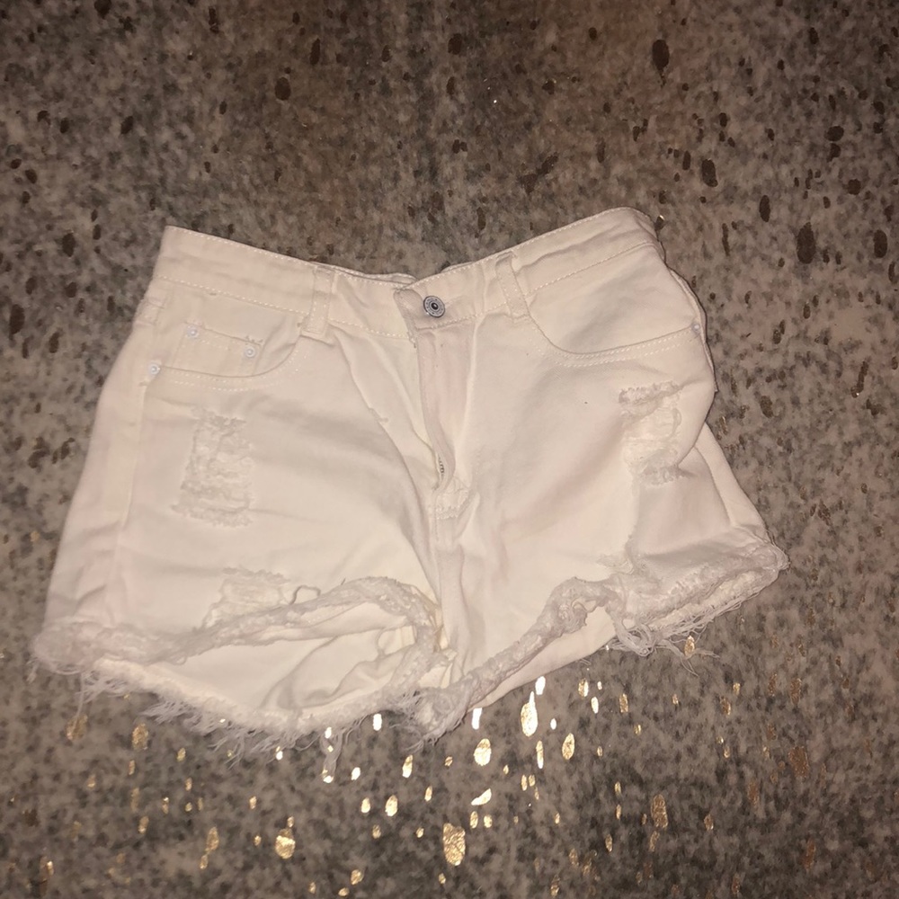 White distressed shorts